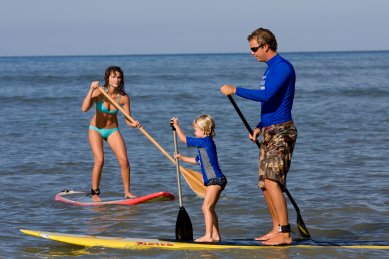 All ages can enjoy stand up paddle boarding. www.mauisportsunlimited.com