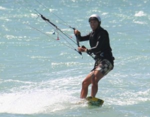 a man riding a wave on top of a body of water