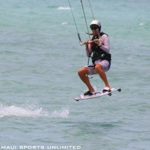 a man riding a surfboard in the water