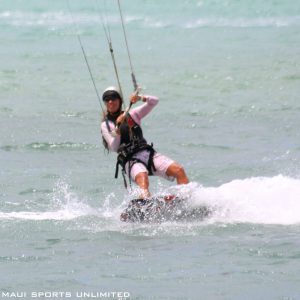 a man riding a surfboard in the water